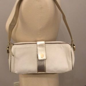 White and gold purse